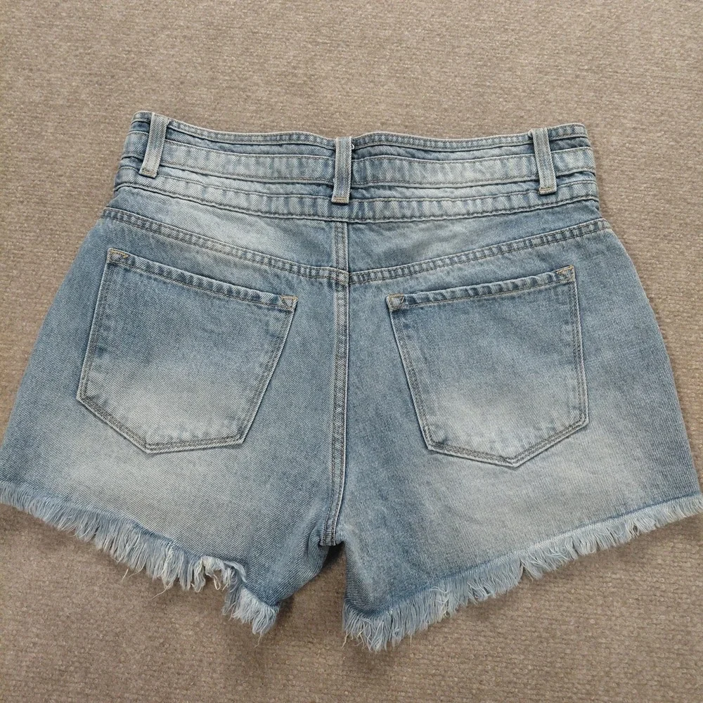 Kancan Women's 9 | 28 High Waisted Thick Band Cut Off Blue Raw Hem Denim Shorts